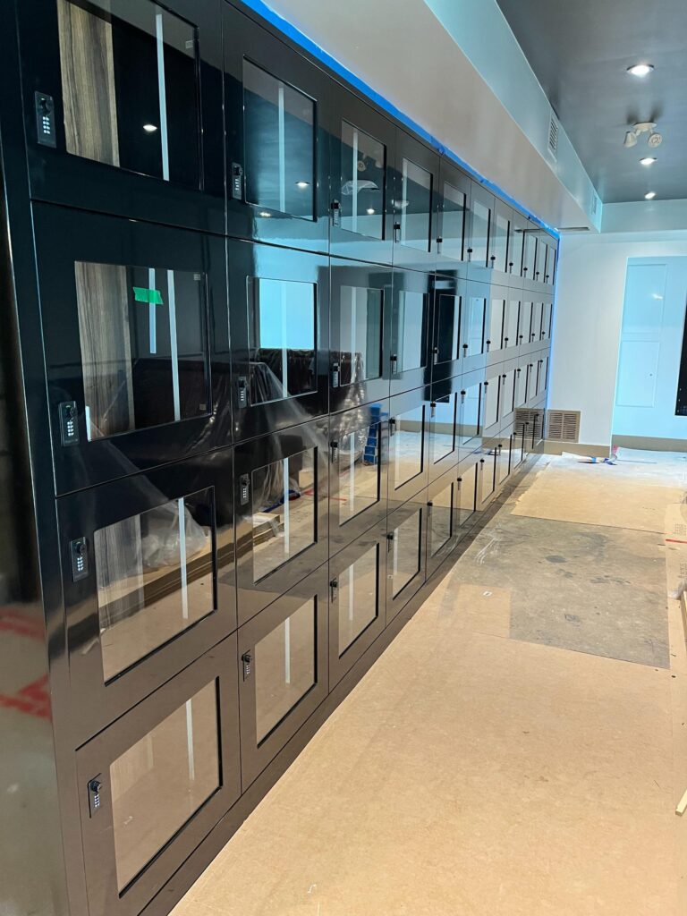 Long black-framed glass partition wall in an office interior
